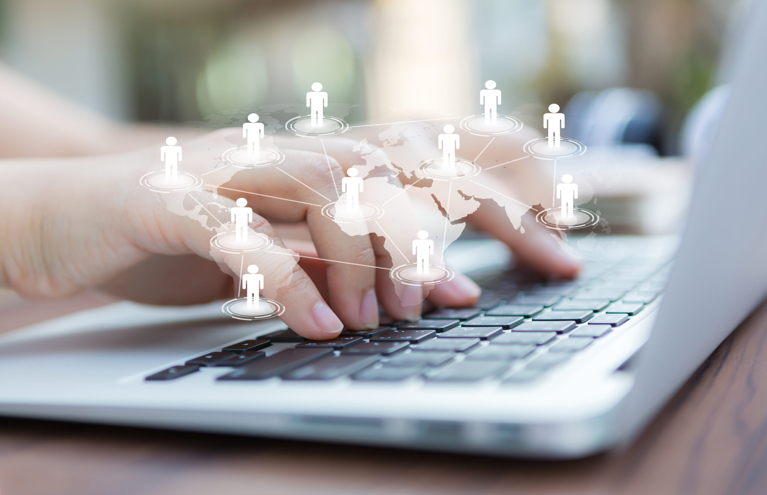 Closeup of business woman hand typing on laptop keyboard.